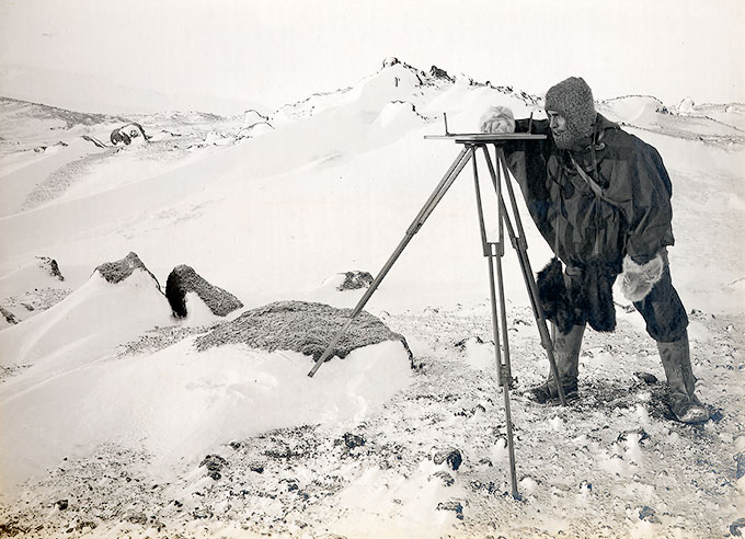 Geologist Frank Debenham surveying