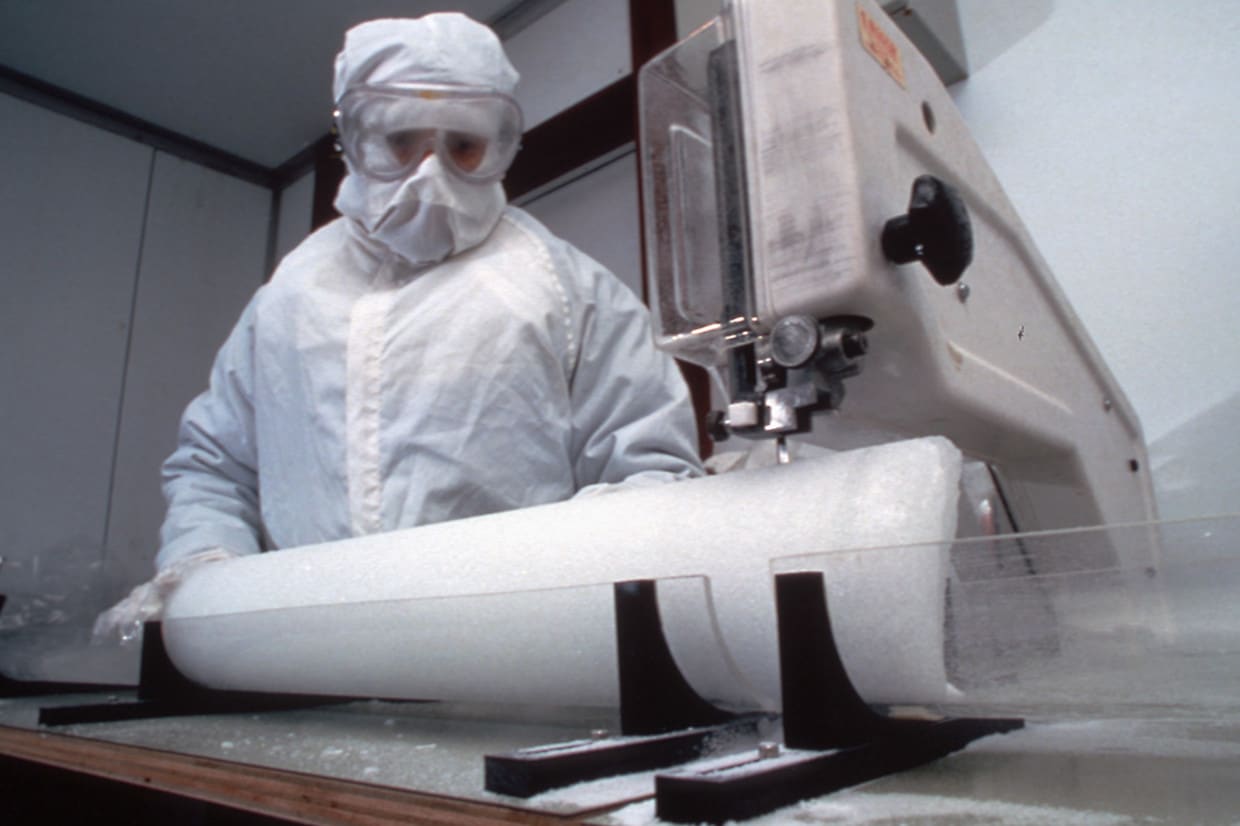 Cutting an ice core for analysis in the cold room at the British Antarctic Survey headquarters, Cambridge