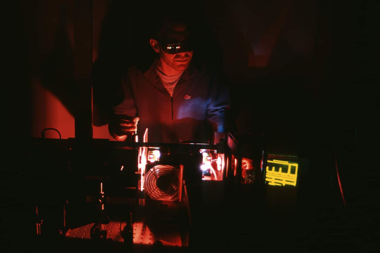 fine tuning the lasers in the LIDAR (Light Detection and Ranging) caboose at Rothera Research Station