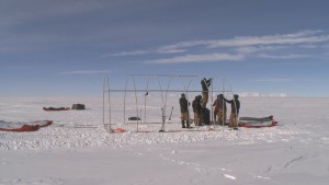 time-lapse speeds up the construction of a sturdy framed tent by seven scientists and support staff